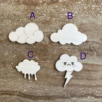 Handmade wooden DIY cloud cutout in four unique styles, ready for paint or decorating
