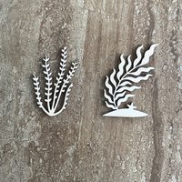 Handmade laser cut wood seaweed shapes in two different styles for DIY crafts