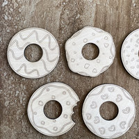Handmade wooden DIY donut cutout in five unique styles, ready for paint or decorating