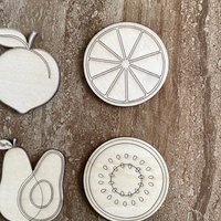 Handmade wooden DIY fruit cutout in four unique styles, ready for paint or decorating