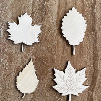 Handmade wooden DIY fall leaf cutout in four unique styles, ready for paint or decorating