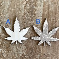 Handmade wooden DIY marijuana leaf cutout in two unique styles, ready for paint or decorating