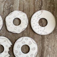 Handmade wooden DIY donut cutout in five unique styles, ready for paint or decorating