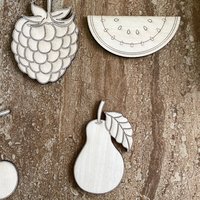 Handmade wooden DIY fruit cutout in five unique styles, ready for paint or decorating