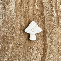 Handmade wooden DIY mushroom cutout ready for paint or decorating