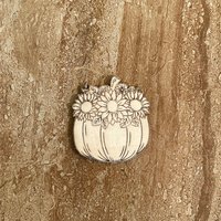 Handmade wooden DIY pumpkin cutout ready for paint or decorating