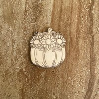 Handmade wooden DIY pumpkin cutout ready for paint or decorating