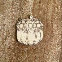 Handmade wooden DIY pumpkin cutout ready for paint or decorating