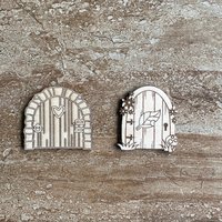 Handmade wooden DIY fairy door cutout in two unique styles, ready for paint or decorating