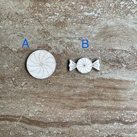 Handmade wooden DIY hard candy disk cutout in two unique styles, ready for paint or decorating