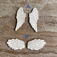 Handmade wooden DIY angel wing cutout in two unique styles, ready for paint or decorating