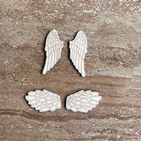 Handmade wooden DIY angel wing cutout in two unique styles, ready for paint or decorating