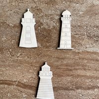 Handmade wooden DIY lighthouse cutout in three unique styles, ready for paint or decorating