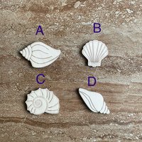 Handmade wooden DIY sea shell cutout in four unique styles, ready for paint or decorating
