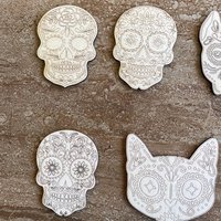 Handmade wooden DIY sugar skull cutout in five unique styles, ready for paint or decorating