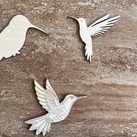 Handmade wooden DIY hummingbird cutout in three unique styles, ready to paint or decorate