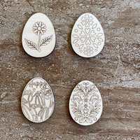 Handmade wooden DIY Easter egg cutout in four unique styles, ready for paint or decorating