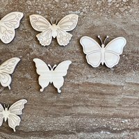 Handmade wooden DIY butterfly cutout in six unique styles, ready to paint or decorate