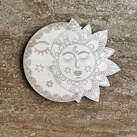 Handmade wooden DIY sun and moon cutout ready for paint or decorating