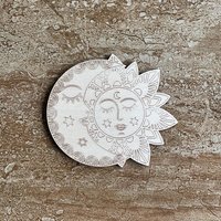 Handmade wooden DIY sun and moon cutout ready for paint or decorating