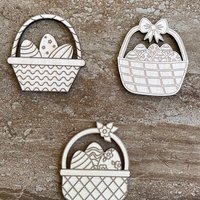 Handmade wooden DIY Easter basket cutout in three unique styles, ready for paint or decorating