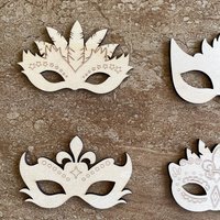 Handmade wooden DIY mardi gras mask cutout in four unique styles, ready for paint or decorating