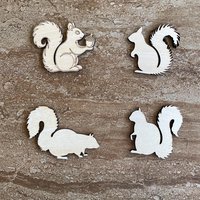 Handmade wooden DIY squirrel cutout in four unique styles, ready to paint or decorate