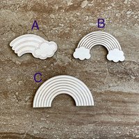 Handmade wooden DIY rainbow cutout in three unique styles, ready for paint or decorating