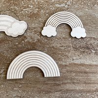 Handmade wooden DIY rainbow cutout in three unique styles, ready for paint or decorating