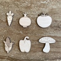 Handmade wooden DIY vegetable cutout in six unique styles, ready for paint or decorating