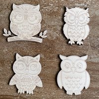 Handmade wooden DIY owl cutout in four unique styles, ready to paint or decorate