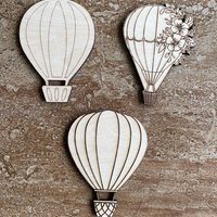 Handmade wooden DIY hot air balloon cutout in three unique styles, ready for paint or decorating