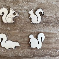 Handmade wooden DIY squirrel cutout in four unique styles, ready to paint or decorate