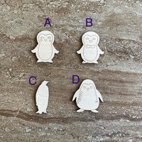 Handmade wooden DIY penguin cutout in four unique styles, ready to paint or decorate