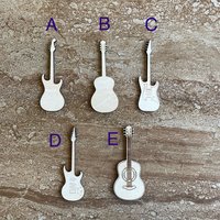 Handmade wooden DIY guitar cutout in five unique styles, ready for paint or decorating