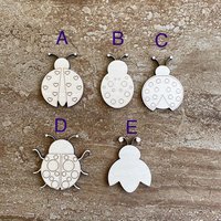 Handmade wooden DIY ladybug cutout in five unique styles, ready to paint or decorate