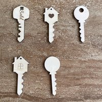 Handmade wooden DIY key cutout in five unique styles, ready for paint or decorating