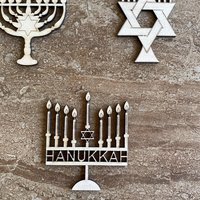 Handmade wooden DIY menorah cutout in three unique styles, ready for paint or decorating