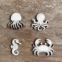 Handmade wooden DIY sea life cutout in four unique styles, ready for paint or decorating