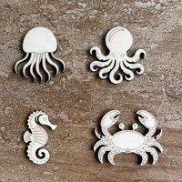 Handmade wooden DIY sea life cutout in four unique styles, ready for paint or decorating