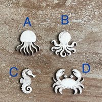 Handmade wooden DIY sea life cutout in four unique styles, ready for paint or decorating