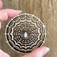 Handmade wooden DIY spider web cutout ready for paint or decorating