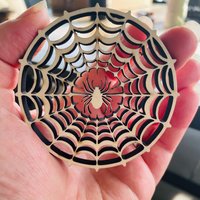 Handmade wooden DIY spider web cutout ready for paint or decorating