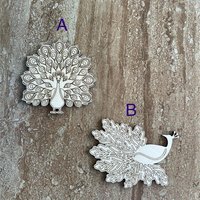 Handmade wooden DIY peacock cutout in two unique styles, ready to paint or decorate