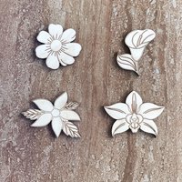 Handmade wooden DIY flower cutout in four unique styles, ready for paint or decorating