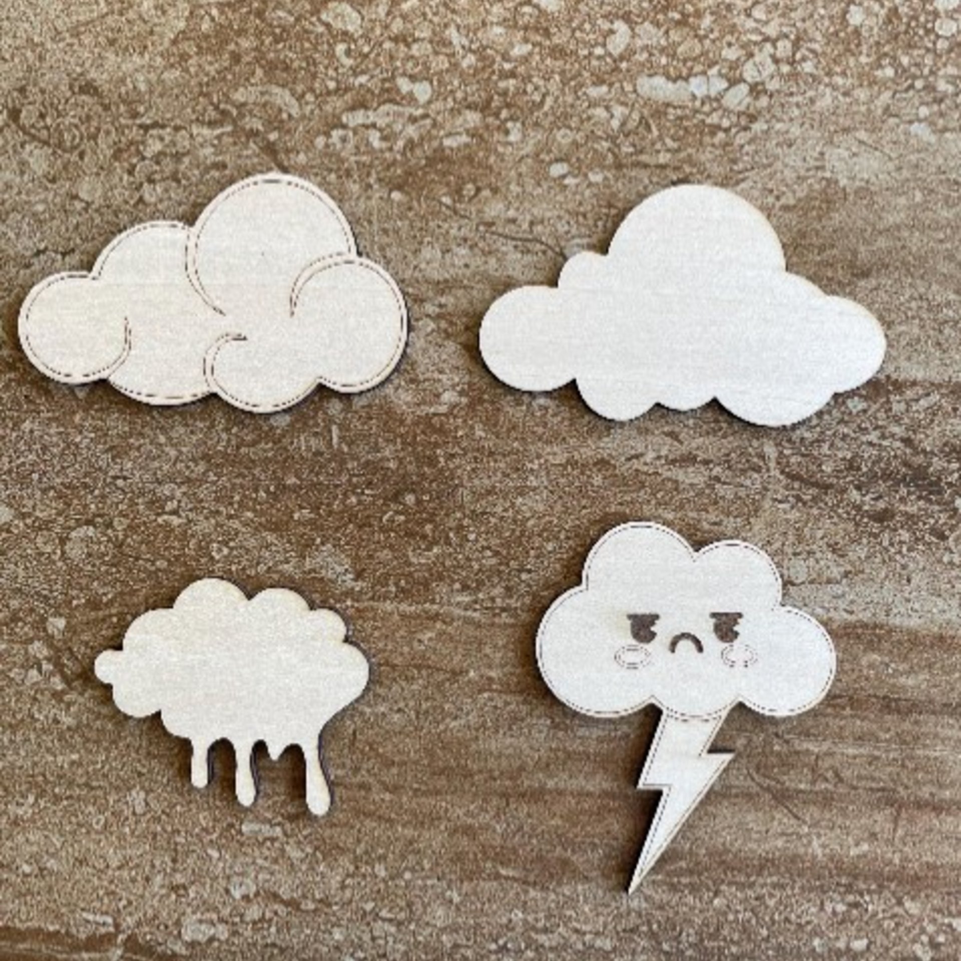 Handmade wooden DIY cloud cutout in four unique styles, ready for paint or decorating