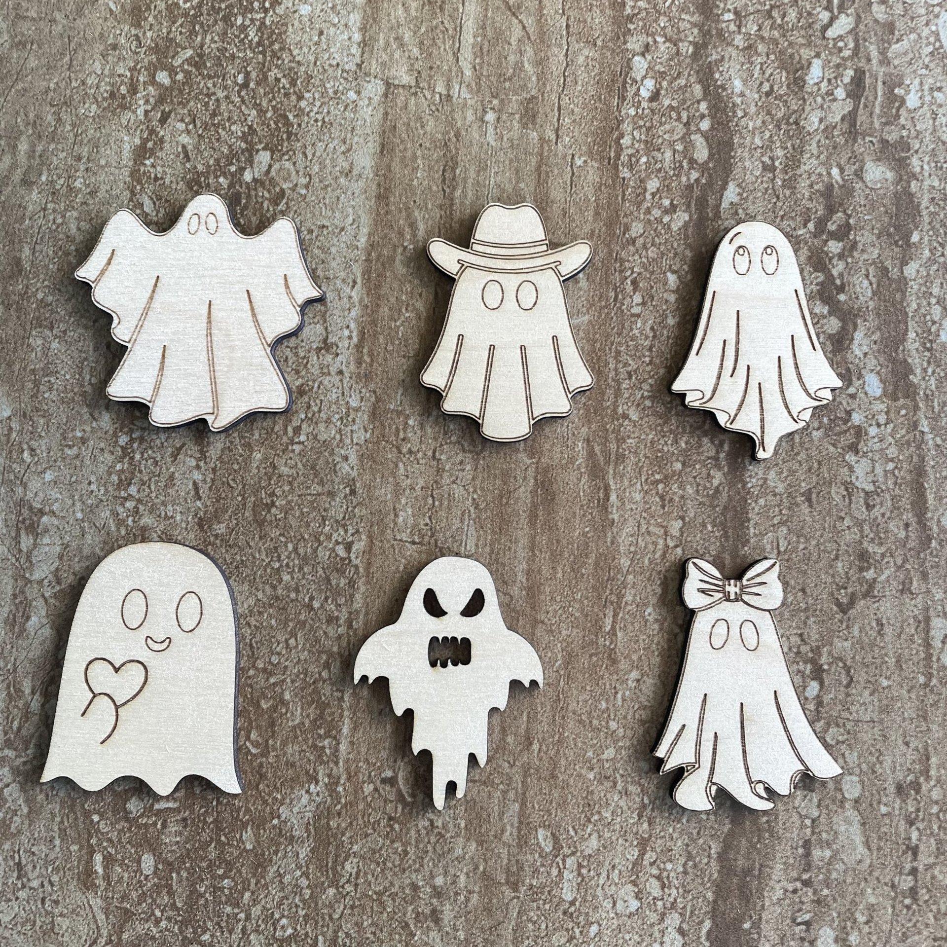 Handmade wood DIY ghost cutout available in 6 different styles for painting and crafting projects