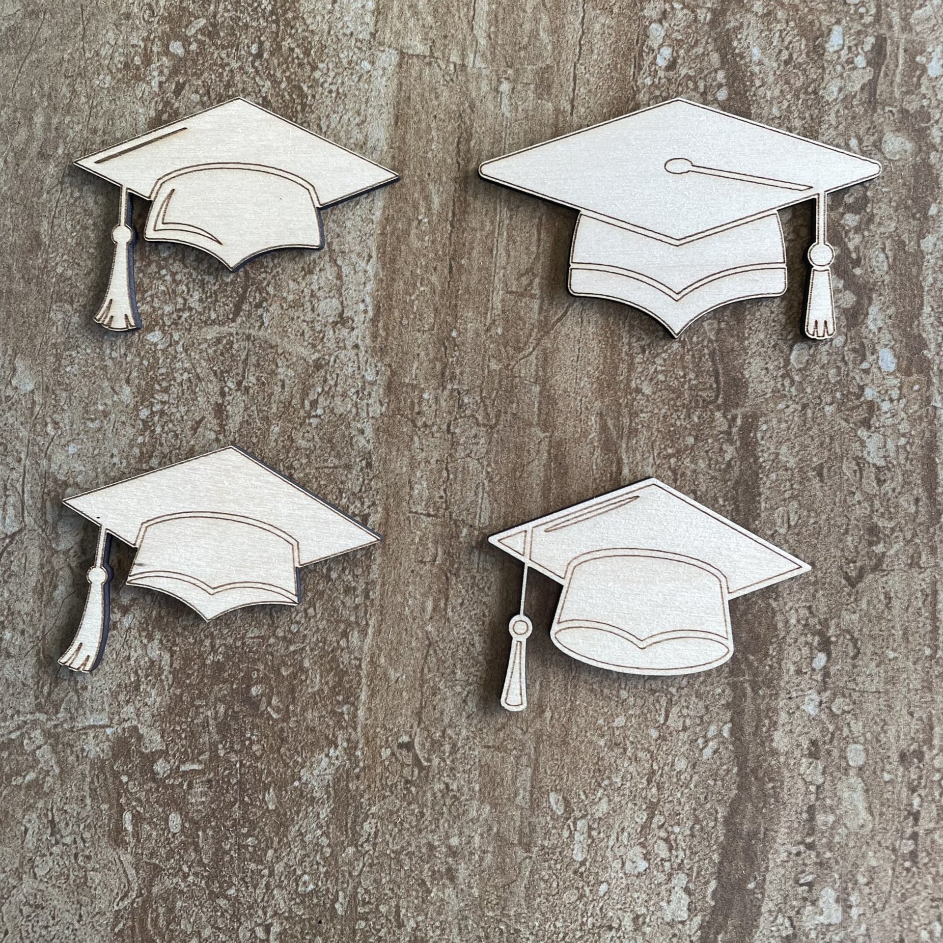 Handmade wood DIY graduation cap cutouts in four different styles