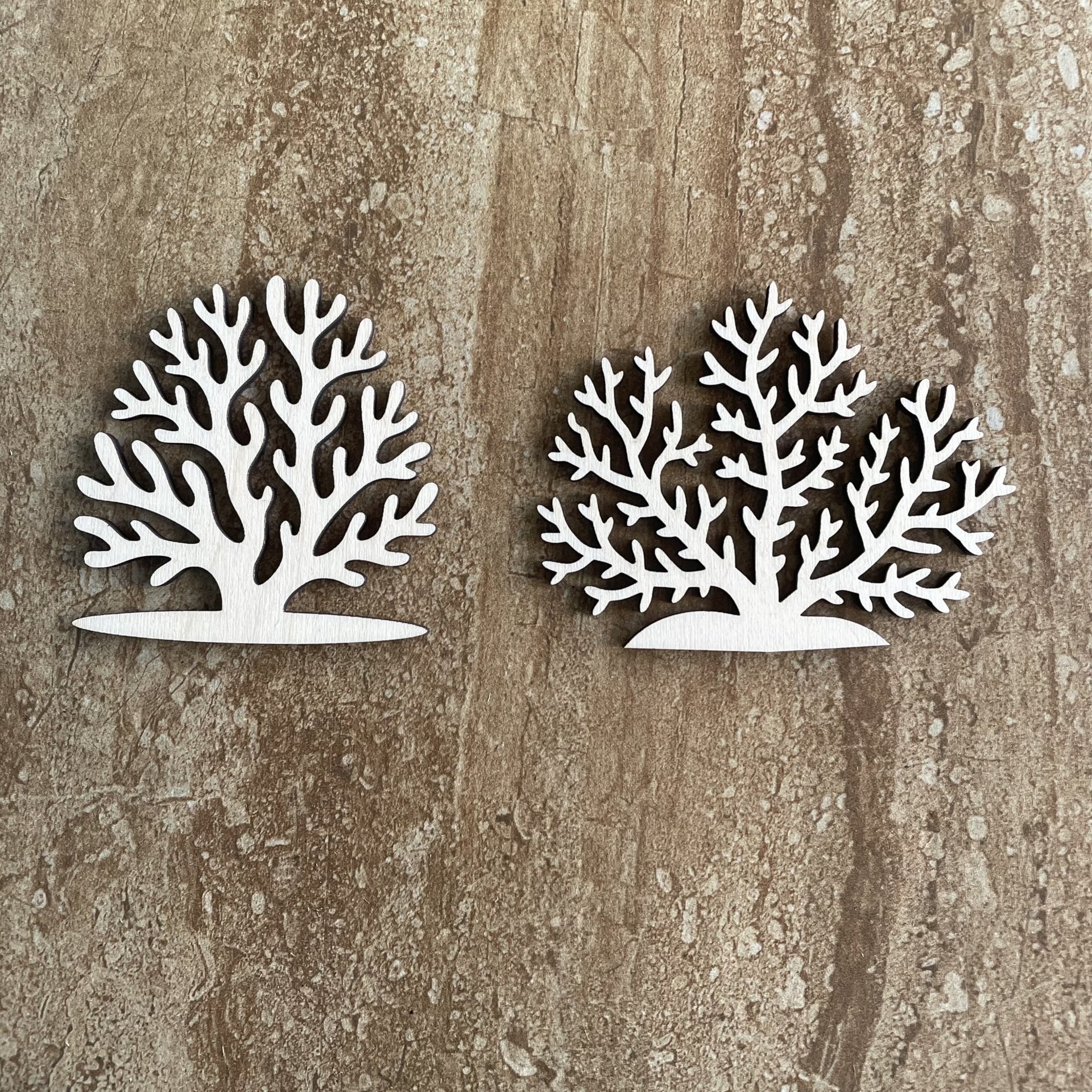 Handmade laser cut wood seaweed shapes in two different styles for DIY crafts