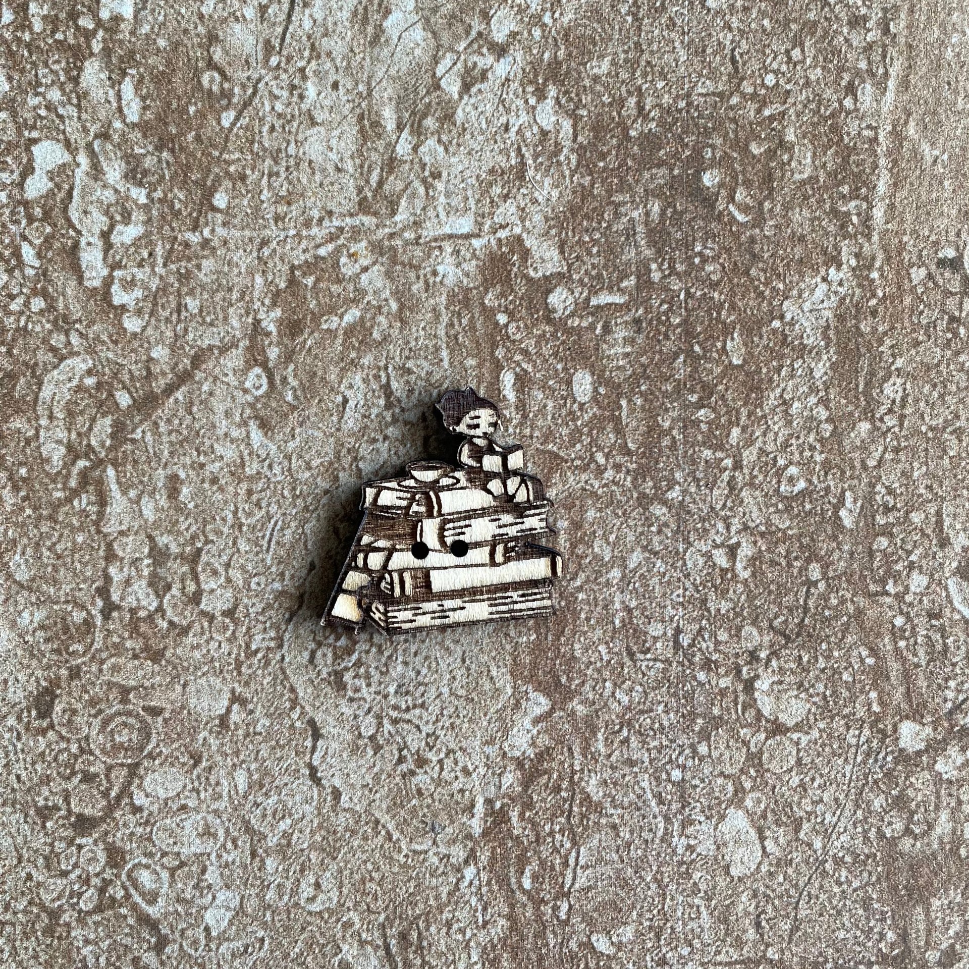 Handmade wooden book-shaped buttons for crafts, sewing, and scrapbooking projects